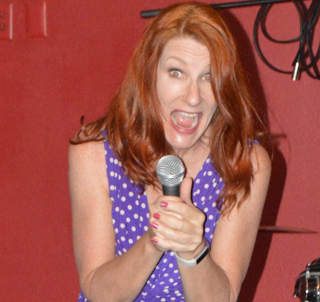Redhead comedian Laurie Ayers